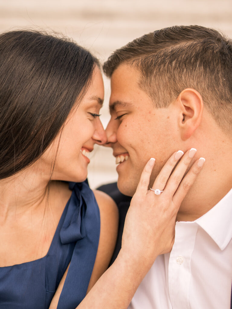 engaged couple at Detroit institute of arts smiling