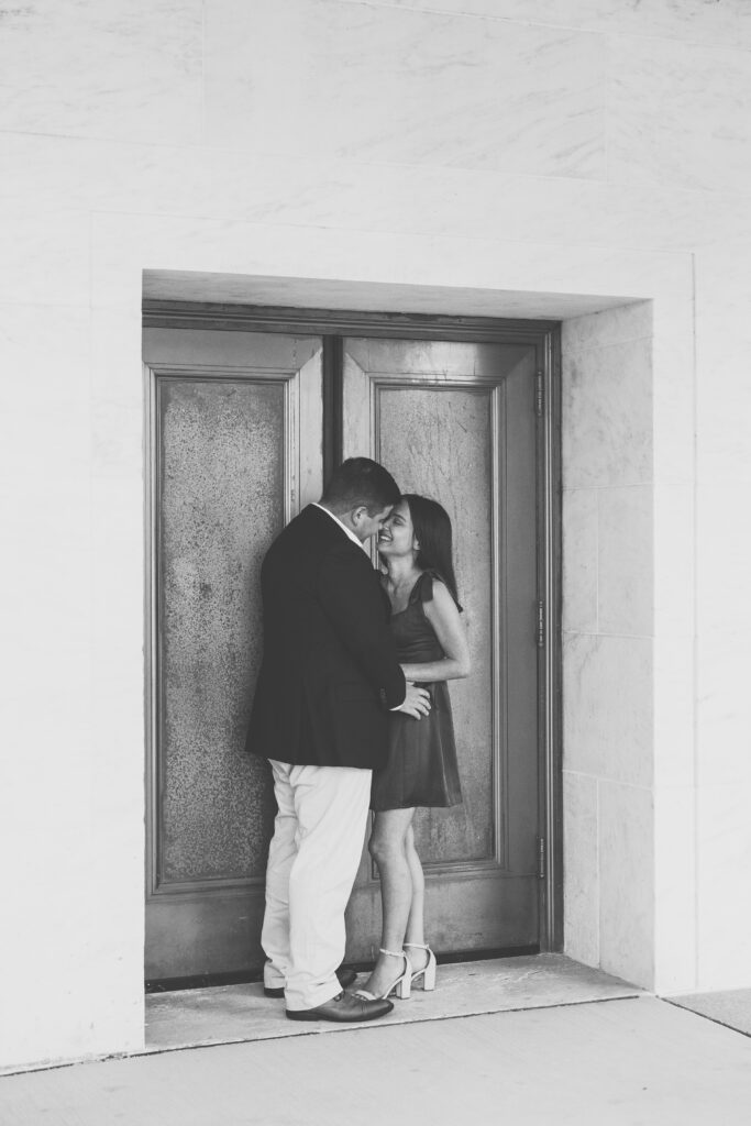 engaged couple at Detroit institute of arts smiling