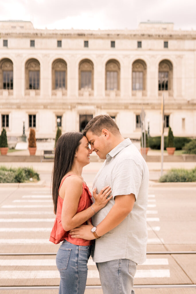 engaged couple at Detroit institute of arts smiling