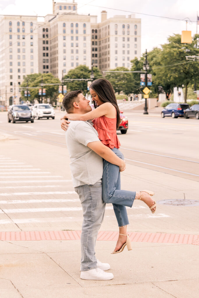 engaged couple at Detroit public library smiling
