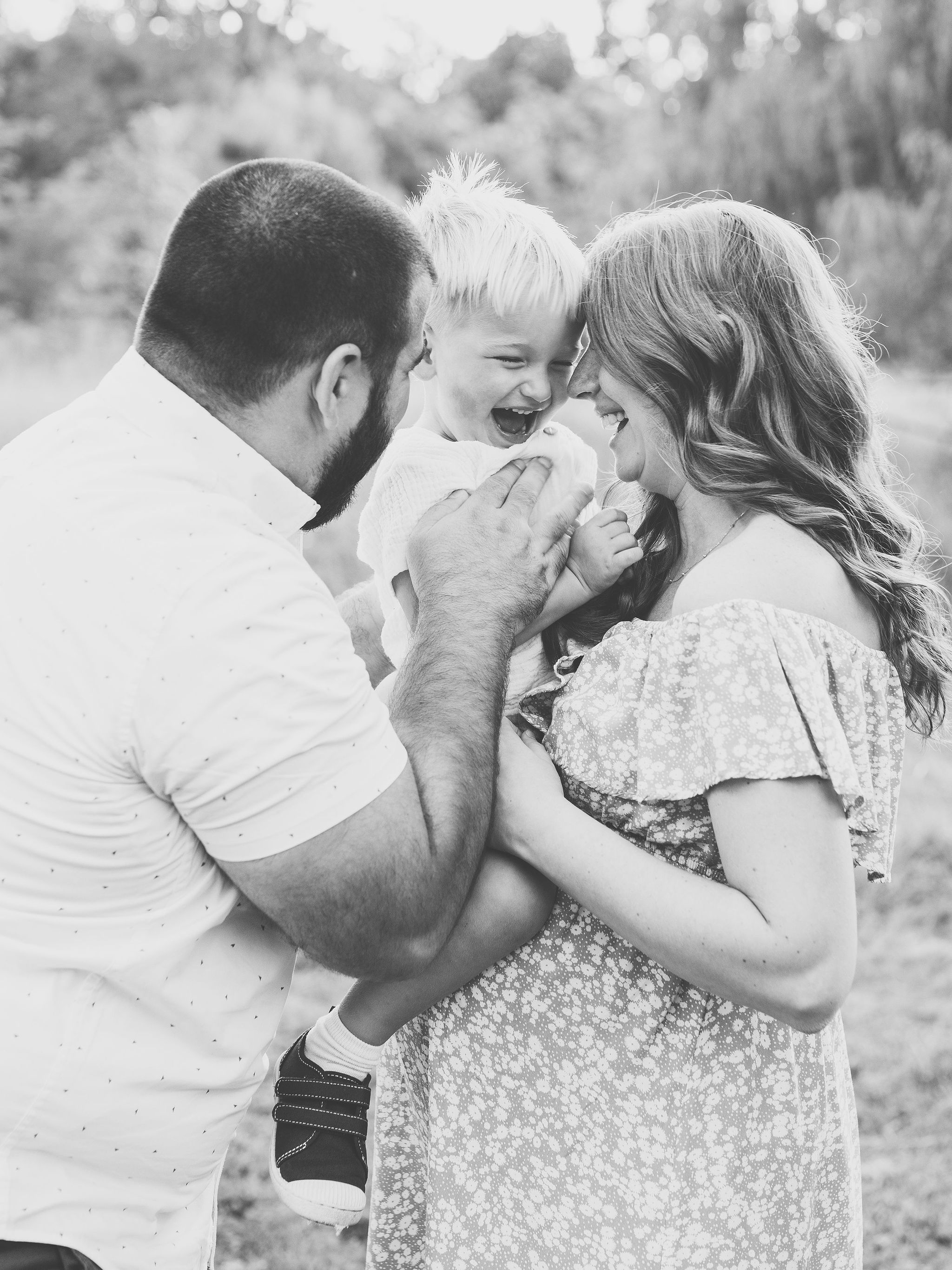 Family laughing at maternity session Ann Arbor, MI